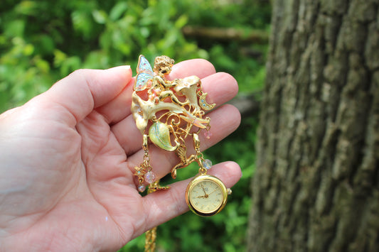 Vintage Kirks Folly Moon Flower Fairy Clock Necklace ~  Gold Tone~ Beautiful Vintage piece ~ 24” chain ~ 3.65”x1.65”~ 1” round Clock ~